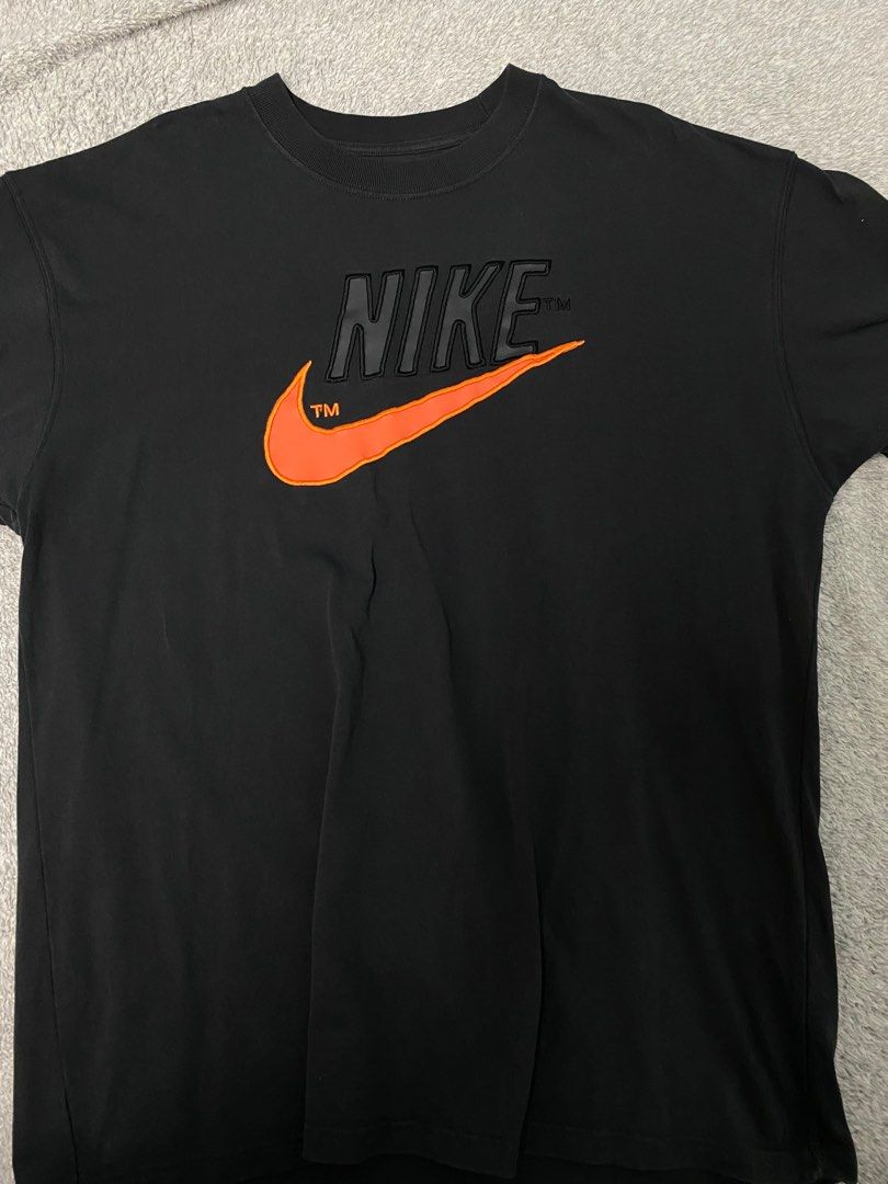 Black nike shirt with orange sale swoosh