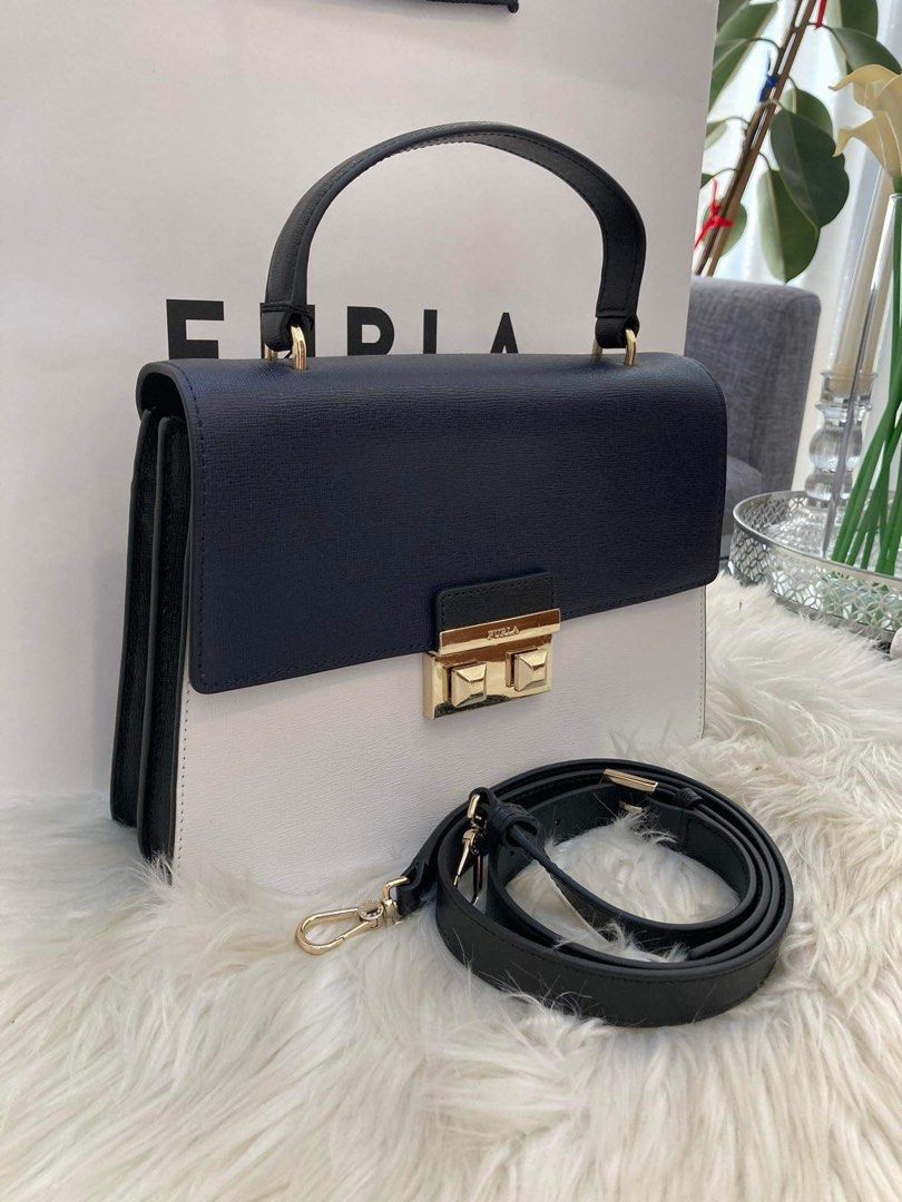 💯ORIGINAL FURLA BELLA TOP HANDLE CHALK NERO OCE (Category: Luxury Bags & Wallets) located in Quezon City. Submitted by ashongsstore (Listing ID 1286408749, Image 1). Description: 🖤FU RLA COLLECTION🖤 🇵🇭ONHAND🇵🇭 New Arrivals ‼️Please look at our pictures as that is exactly what you are purchasing‼️ 💯GUARANTEED ORIGINAL AND AUTHENTIC or TRIPLE YOUR MONEY BACK! Not REPLICA, OEM, TOP GRADE QUALITY, AUTHENTIC QUALITY or Any other Terms to DENOT