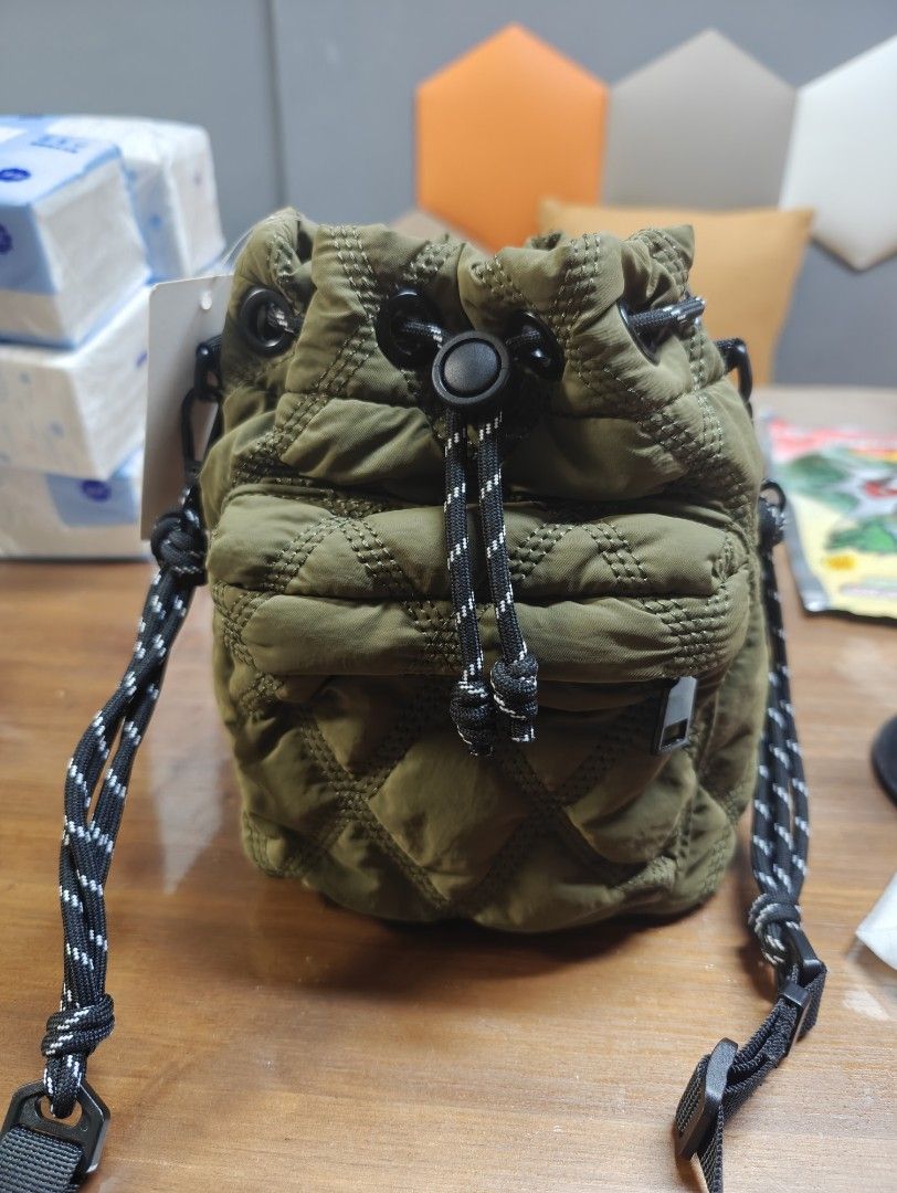 Quilted small bucket sling bag
