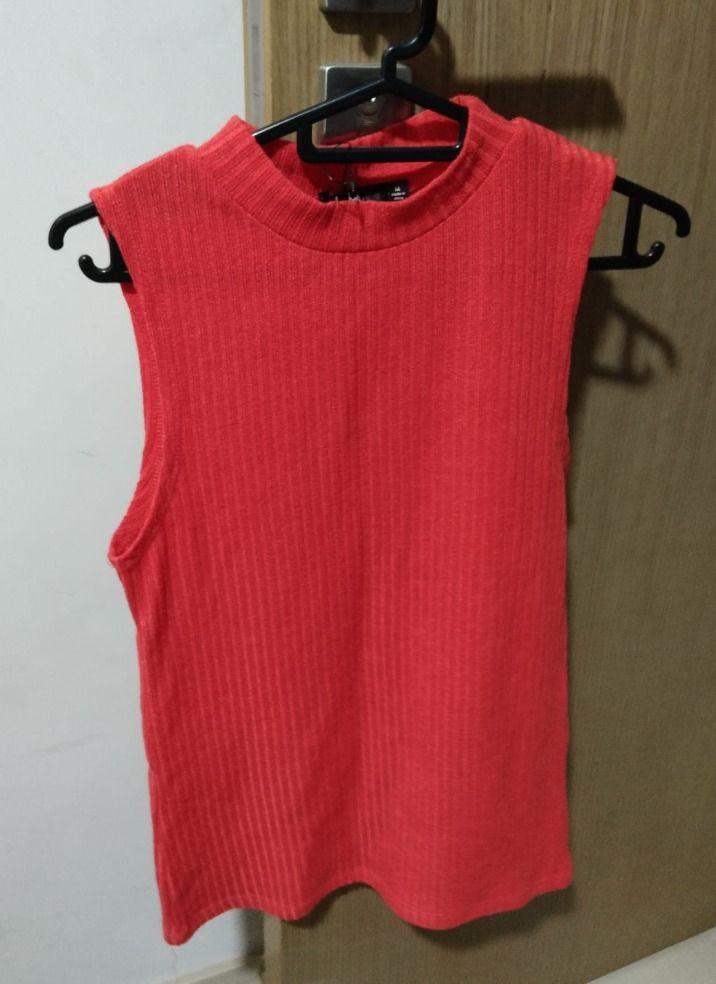 Red sleeveless hotsell vest