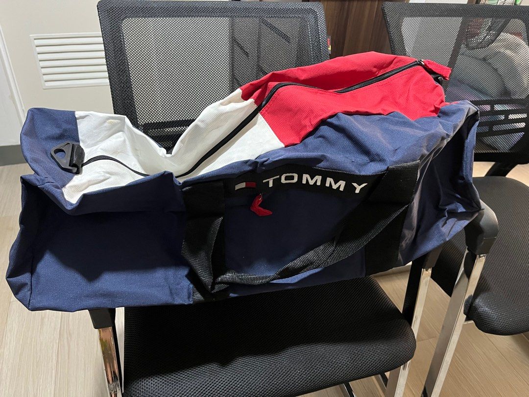 Large Travel Bags (Category: Backpacks) located in Makati City. Submitted by bwsventures (Listing ID 1286410508, Image 2). Description: P400 each 1) Tommy - not original Super/oversized traveler bags Navy blue, red, white Length 70 cm Width 35 cm 2) SOLD Benetton - original Black Length: 43cm width: 20cm 3) Benetton - original 30-faded navy blue bag Very well used Big size .