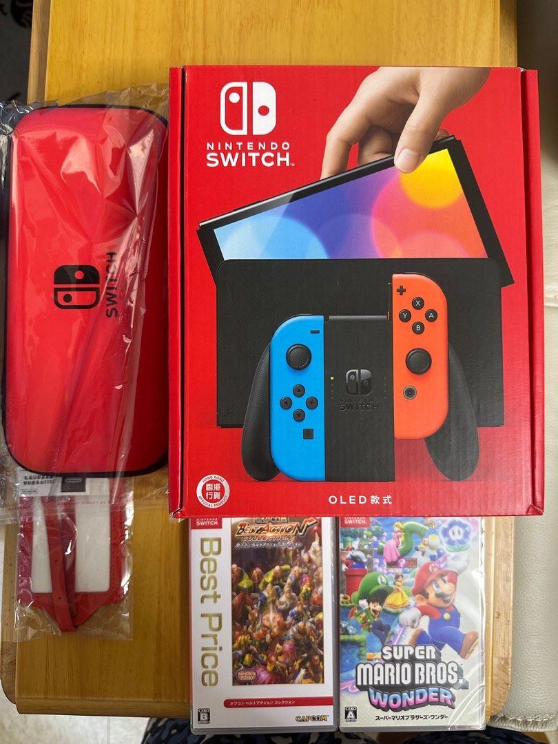 Switch oled （分類：Nintendo 任天堂）位於 Hong Kong。 由 mwwsw 提交（商品編號 1286498582，圖片 1）。簡介： 全套連兩隻game,保護貼，保護機套 葵芳地鐵站交收。
