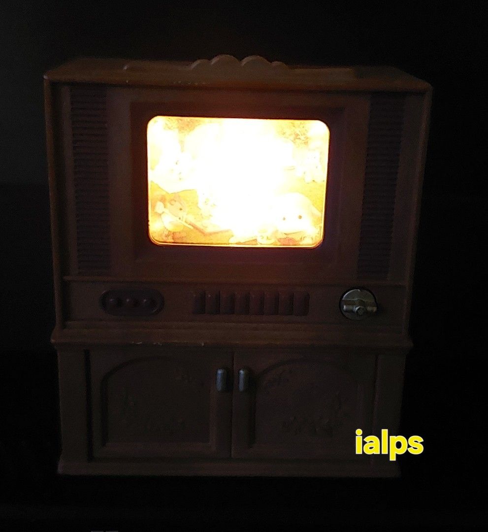 Sylvanian Families Battery Operated TV Set (Category: Kids Toys) located in Angono. Submitted by lpsflover (Listing ID 1286454876, Image 2). Description: Needs 2x AAA batteries to work (not included). Turn the knob horizontally to make the TV set light up, and vertically to turn it off. Turned on twice (once during unboxing years ago, and once this week to check it it still working). Not available in malls anymore. Payment via BDO/BPI. Shipping v