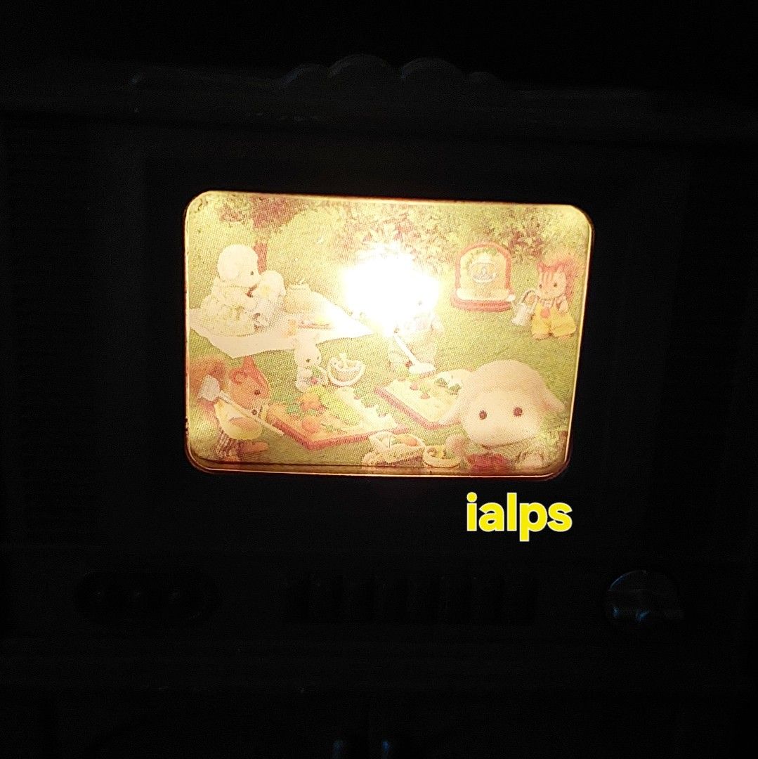 Sylvanian Families Battery Operated TV Set (Category: Kids Toys) located in Angono. Submitted by lpsflover (Listing ID 1286454876, Image 3). Description: Needs 2x AAA batteries to work (not included). Turn the knob horizontally to make the TV set light up, and vertically to turn it off. Turned on twice (once during unboxing years ago, and once this week to check it it still working). Not available in malls anymore. Payment via BDO/BPI. Shipping v