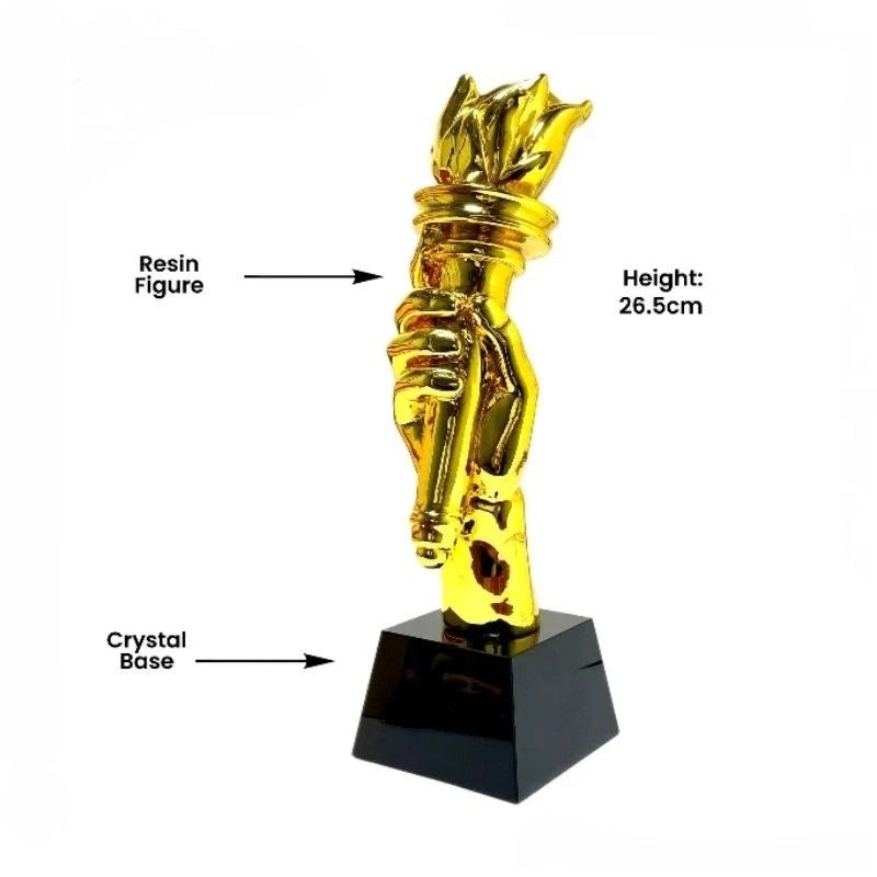 Torch Crystal Trophy (Category: Other Sports Equipment and Supplies) located in Manila. Submitted by ariesmediamusicsports (Listing ID 1286516618, Image 1). Description: This elegant trophy features a captivating design with a resin figure holding a torch aloft. The torch symbolizes enlightenment, progress, and leadership. The figure, coated in a lustrous gold finish, exudes a sense of accomplishment and triumph. The trophy stands at a height of 
