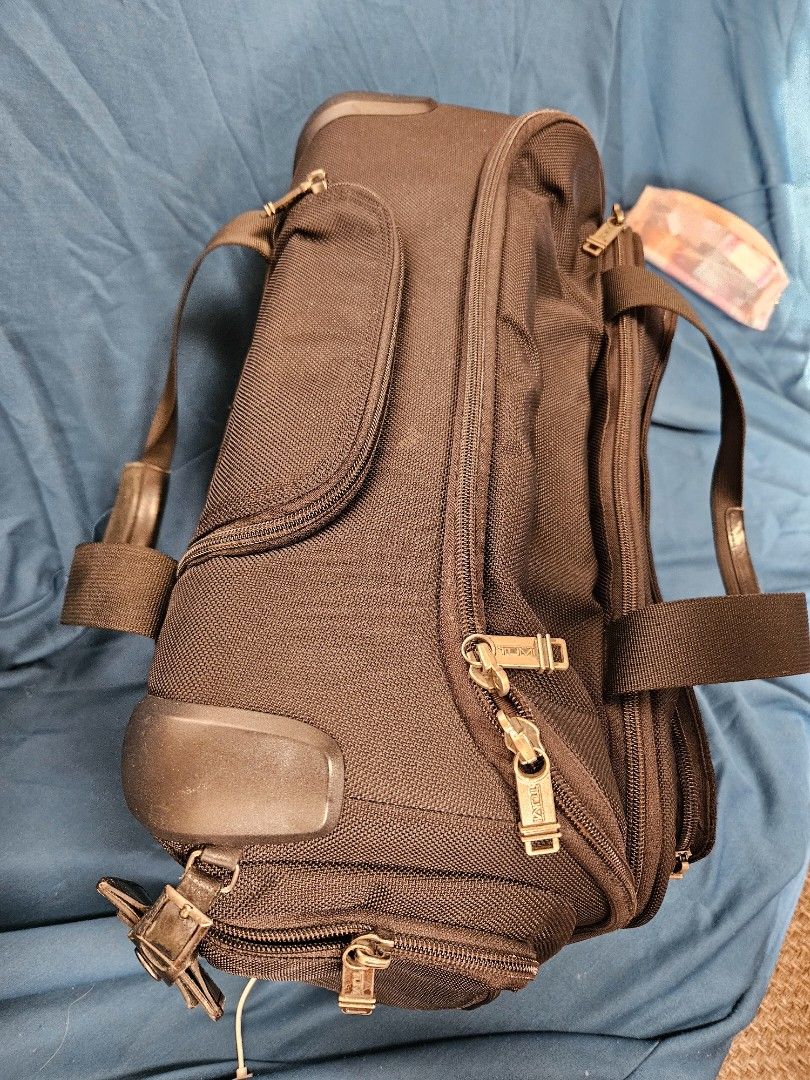 TUMI ALPHA 2 WHEELED brief (Category: Briefcases) located in Paranaque City. Submitted by tigerbomb (Listing ID 1286498385, Image 2). Description: -In good condition. -Preowned with signs of travel wear and tear from normal use, including: minimL scratches from right side -All zippers work and move smoothly. No tears or deep damage to fabric or leather. issue: left wheel damage Price is negotiable for sure buyer Please see pictures for best detai