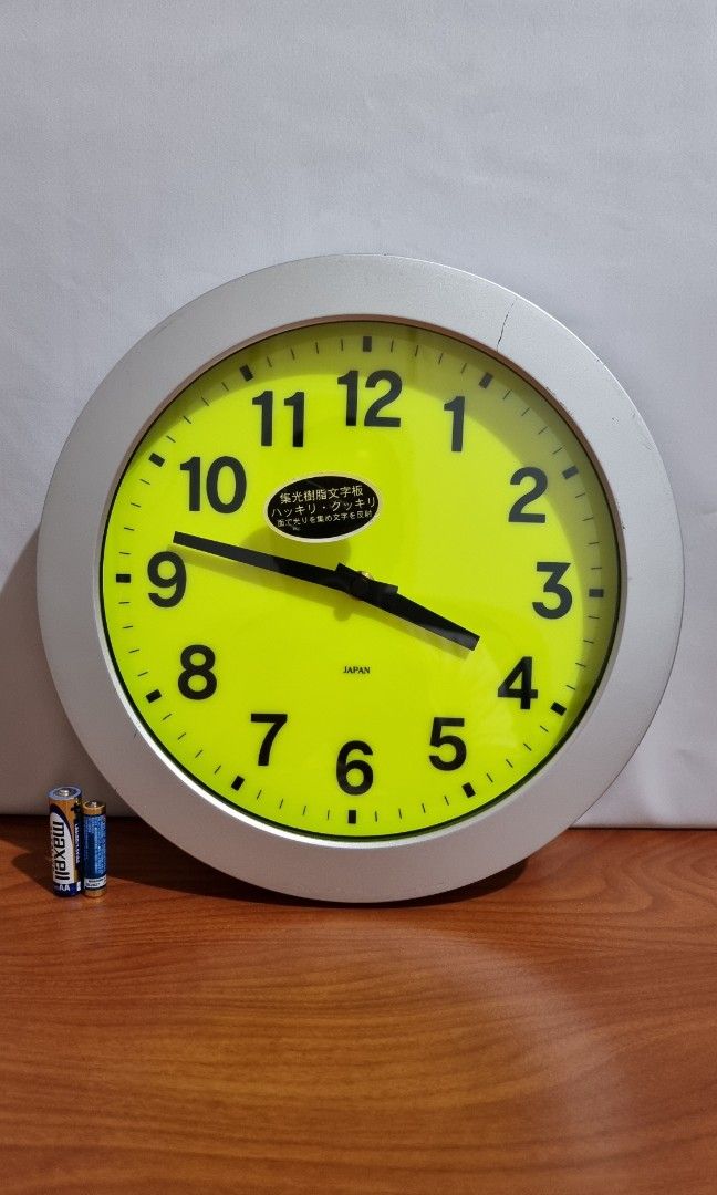 Wall Clock (Category: Clocks) located in Binangonan. Submitted by caaaris (Listing ID 1286524187, Image 2). Description: Wall Clock Keeps accurate time Total Diameter 28.3 cm Dial Diameter 23 cm With signs of use, scuffs, and scratches Light-concentrating resin dial (glow is faded) SKP Wall Clock machine movement, Japan Country of origin: Japan.