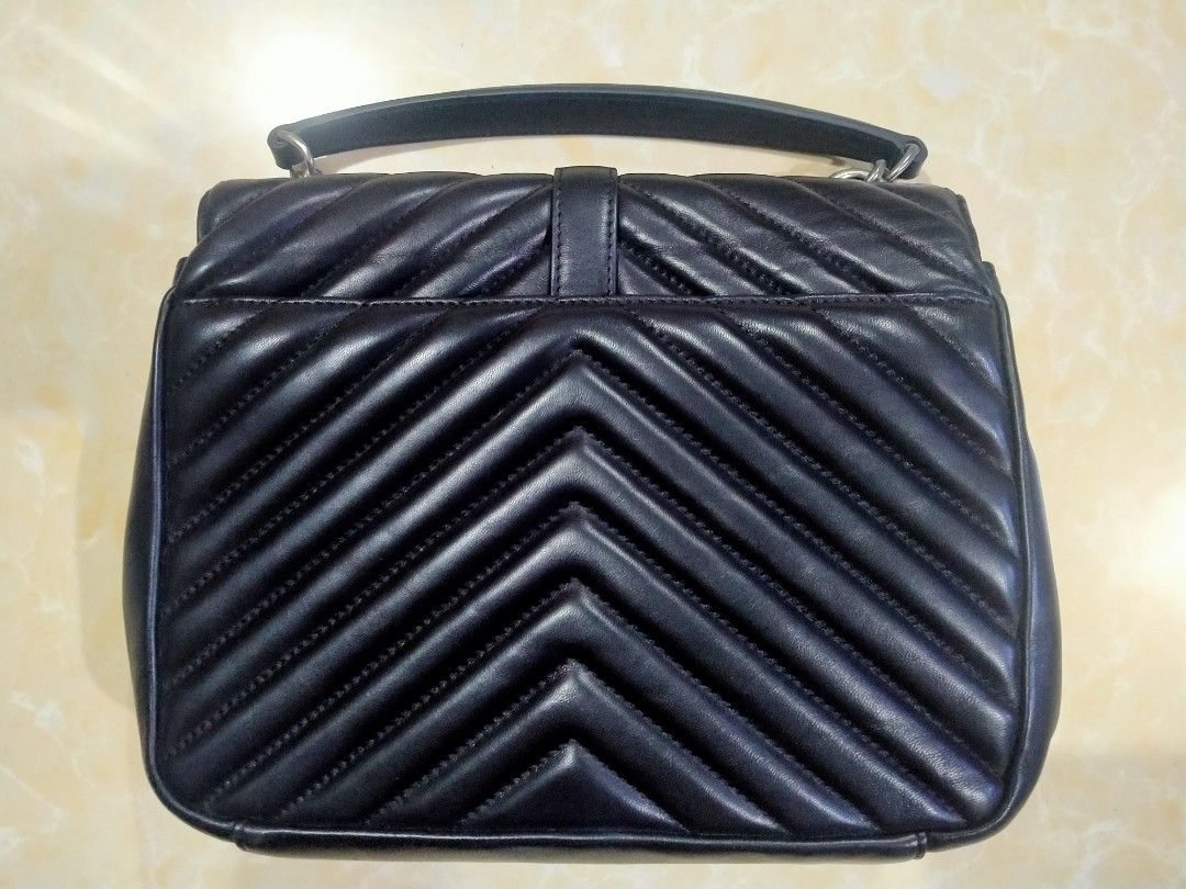 YSL top handle bag (Category: Luxury Bags & Wallets) located in Naga. Submitted by queburock (Listing ID 1246697608, Image 2). Description: used but in very good condition bag only. no inclusions..