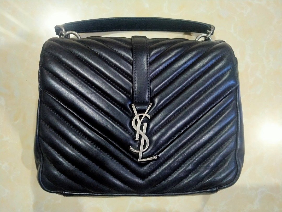 YSL top handle bag (Category: Luxury Bags & Wallets) located in Naga. Submitted by queburock (Listing ID 1246697608, Image 1). Description: used but in very good condition bag only. no inclusions..