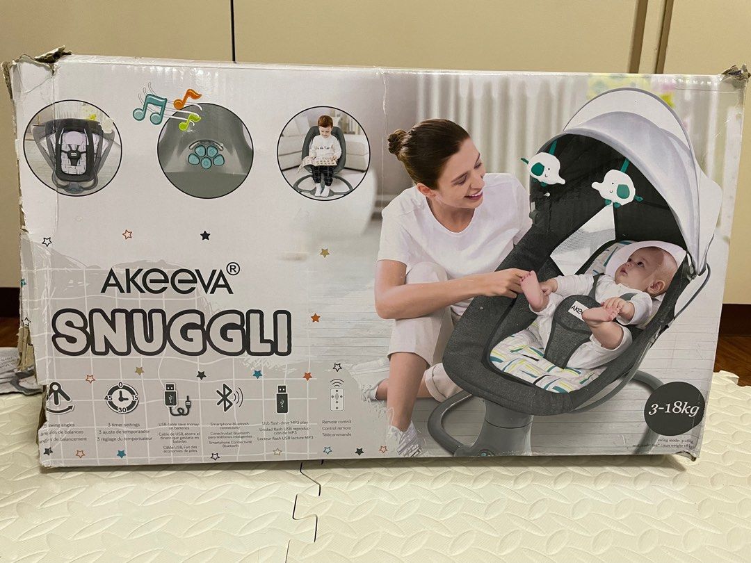 Akeeva Snuggli (Category: Cots & Cribs) located in Mandaluyong City. Submitted by kchloe__ (Listing ID 1286725776, Image 1). Description: Pre loved akeeva reclinable automatic snoozer swing, may small hole lang sa net yung pang cover barely visible naman.