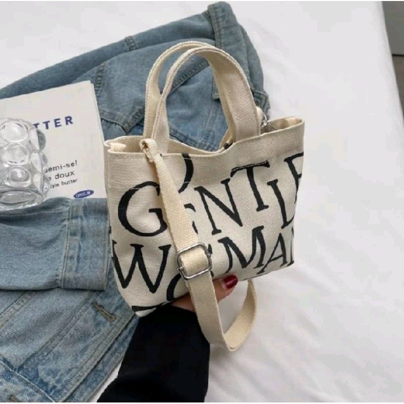 Mini canvas top sling bag
