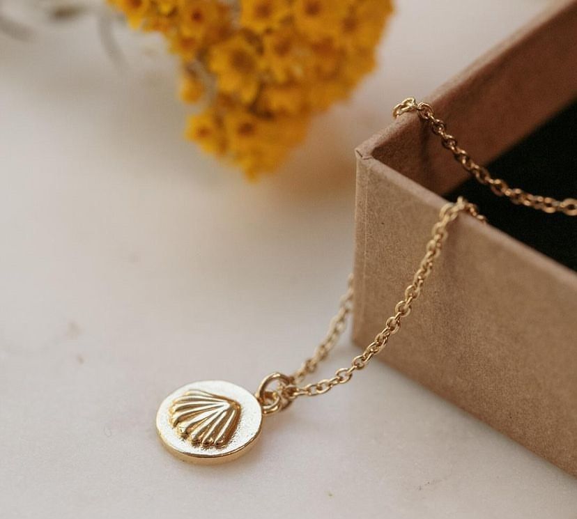 Damas gold coin shop