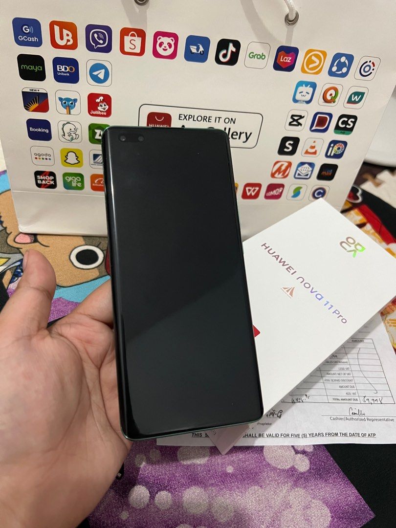 Huawei Nova 11 pro (Category: Huawei) located in Quezon City. Submitted by skyleeeee (Listing ID 1286759771, Image 3). Description: Huawei Nova 11 pro (edge) 8gb ram 256gb rom bought last Oct 2023 in Huawei Robinsons magnolia still under warranty complete with box and 100w charger + 2 case + huawei folding umbrella (gift from huawei) 99% smooth & like new condition rfs: spare phone meetup around cubao qc .