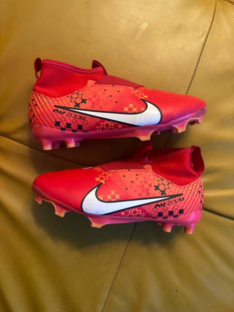 Red mercurial sales football boots