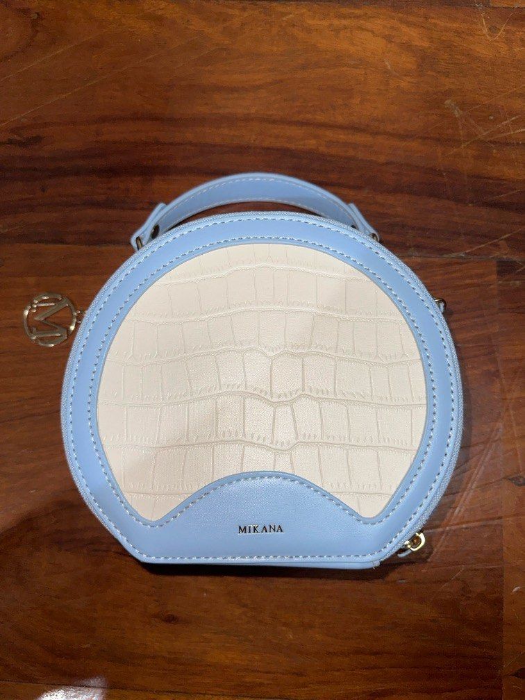 Mikana Powder Blue Bag (Category: Purses & Pouches) located in Pasig City. Submitted by exlim (Listing ID 1286646584, Image 1). Description: Used once, no flaws, stored well. Looks super cute and stores a lot! .