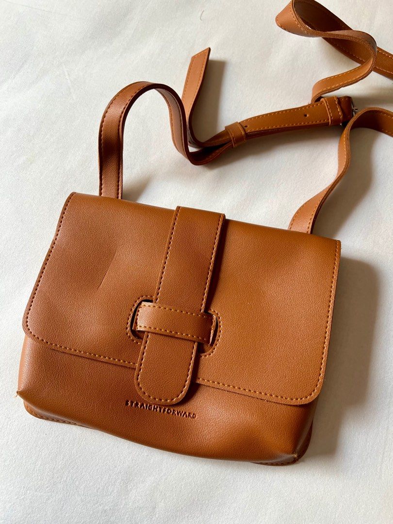 Straightforward Sling Bag (Category: Cross-body Bags) located in Palo. Submitted by van_declutters (Listing ID 1286663457, Image 2). Description: For Sale!! 🤩 Straightforward Sling Bag Still in good condition Used only twice No damage at all Good as brand new Selling bundle of 2 for only 800PHP!! 🤗 DM me for details! 🤗☺️.