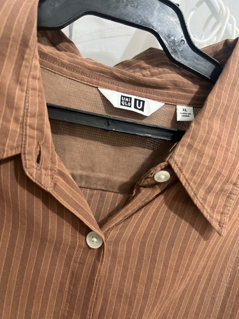 Uniqlo Stripe longsleeves (Category: Longsleeves) located in Quezon City. Submitted by skyleeeee (Listing ID 1286827242, Image 2). Description: Uniqlo brown stripes longsleeve semi see through fabric can fit med to large for women Payment options: Gcash Unionbank BPI Lala.move. pick up S.hopee. checkout Loc. Cubao QC.
