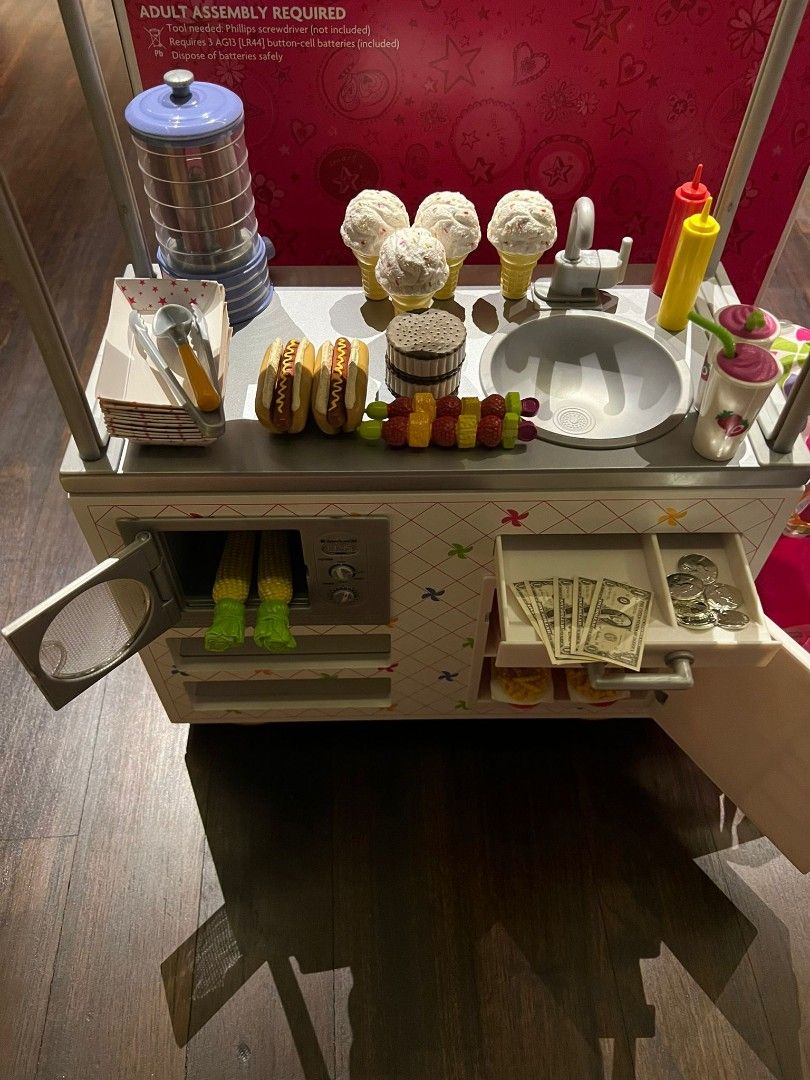 American girl deals hot dog cart