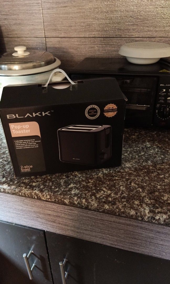 Blakk Pop up toaster (Category: Cookware & Accessories) located in Quezon City. Submitted by marketbasket (Listing ID 1286921386, Image 1). Description: Brand-new Blakk Pop up toaster gifted last Christmas but I already have a toaster. this one is nice it has a cover. I tested it already just to make sure it works..