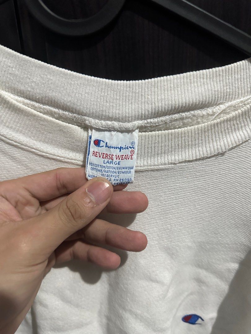 Champion White oversize longsleeve sweatshirt (Category: Hoodies) located in Manila. Submitted by chefkurry (Listing ID 1286933707, Image 2). Description: Champion white oversize sweater Well used Minimal Signs of usage Large on tag Php 900 Manila Area.