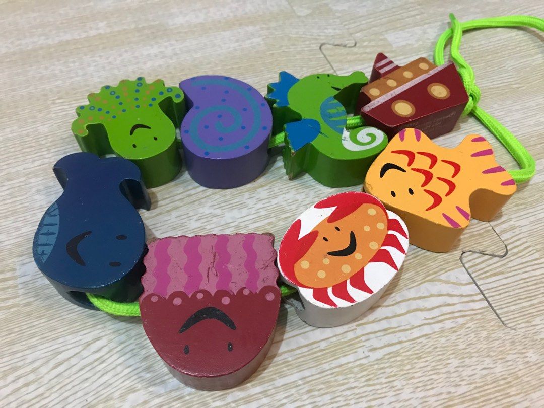 Preloved Wooden Toy - ELC Threading Toy (Category: Infant Playtime) located in Mandaluyong City. Submitted by gulay02 (Listing ID 1287086346, Image 2). Description: Preloved Wooden Toy - ELC Threading Toy With signs of use, complete Pickup from Alabang Payment thru Gcash.