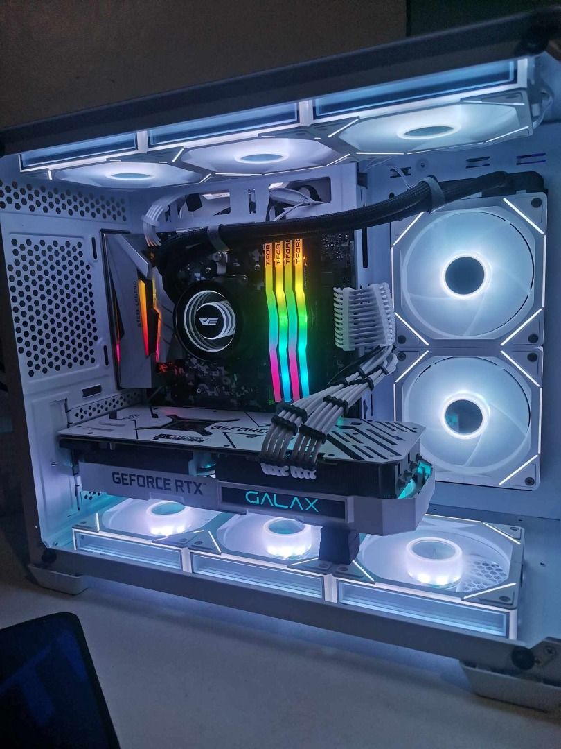 Gaming PC / Gaming Rig / System Unit (Category: Desktops) located in Quezon City. Submitted by rolls1522 (Listing ID 1237849819, Image 2). Description: Gaming Rig (System unit only) For Sale Gaming Rig (System Unit Only) semi white build Specs: ~ Ryzen 5 5600x ~ Asrock Steel Legend B450M (w/box) ~ 32gb Tforce Delta RGB ram 4x8 ~ Zotac RTX 5070 Amp Edition Triplefan (w/box) bnew (hindi un nsa pic update ko nlng pic pag nakunan ko) ~ Darkflash DX24