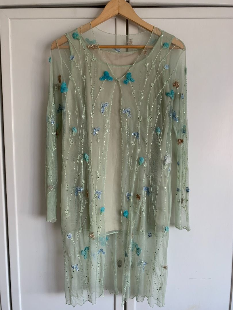 BIYAN, Applique tulle Kebaya top (mint green) with sleeveless silk blouse (Category: Longsleeves) located in Kuala Lumpur. Submitted by shop.marie.preloved (Listing ID 1287027548, Image 3). Description: ✔️Serious buyers only. ✔️Please read the full item description. Applique tulle Kebaya top (mint green) with sleeveless silk blouse by Indonesian designer BIYAN. Size L Length 95cm 100% Polyamide Undergarment included: A sleeveless silk blouse with