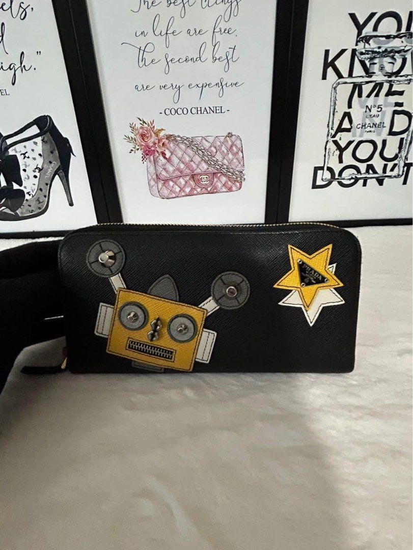 Prada Long Zippy Wallet Robot Capsule Collection (Category: Luxury Bags & Wallets) located in Manila. Submitted by bagislifeshop (Listing ID 1286933852, Image 2). Description: ☑️Available in Pampanga ✅Condition: 8.8/10 ✅ Color: Black ✅Material: Saffiano leather ✅Inclusion: Box .