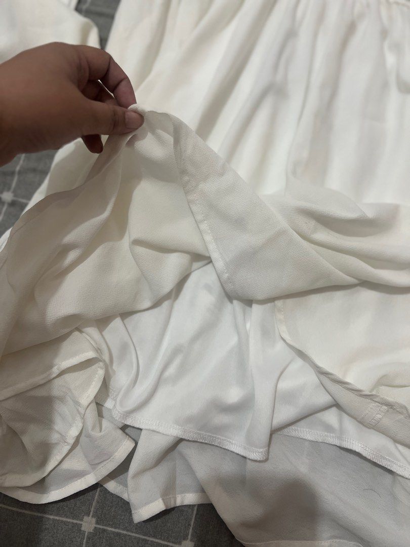 Shein summer dress (Category: Dresses) located in Quezon City. Submitted by skyleeeee (Listing ID 1286909138, Image 3). Description: Shein Summer dress White and blue in actual bell sleeves with inner skirt (see pics) never been used can fit med to semi XL Payment options: Gcash Unionbank BPI Lala.move. pick up S.hopee. checkout Loc. Cubao QC .