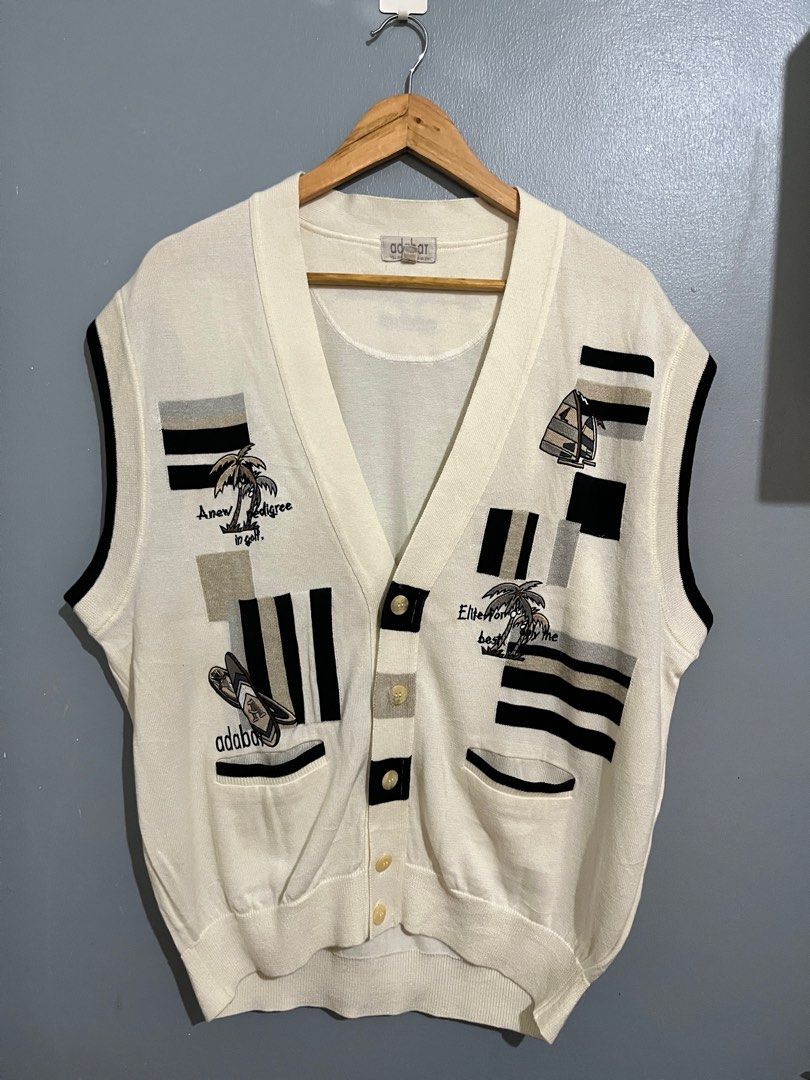 White Button Down Knitted Sweater Vest | y2k preppy winter (Category: Vests) located in Antipolo. Submitted by kiksy.closet (Listing ID 1286922038, Image 1). Description: White Button Down Knitted Sweater Vest | y2k preppy winter Size: 2XL Flaws: Needs wash on certain areas due to stain/discoloration.