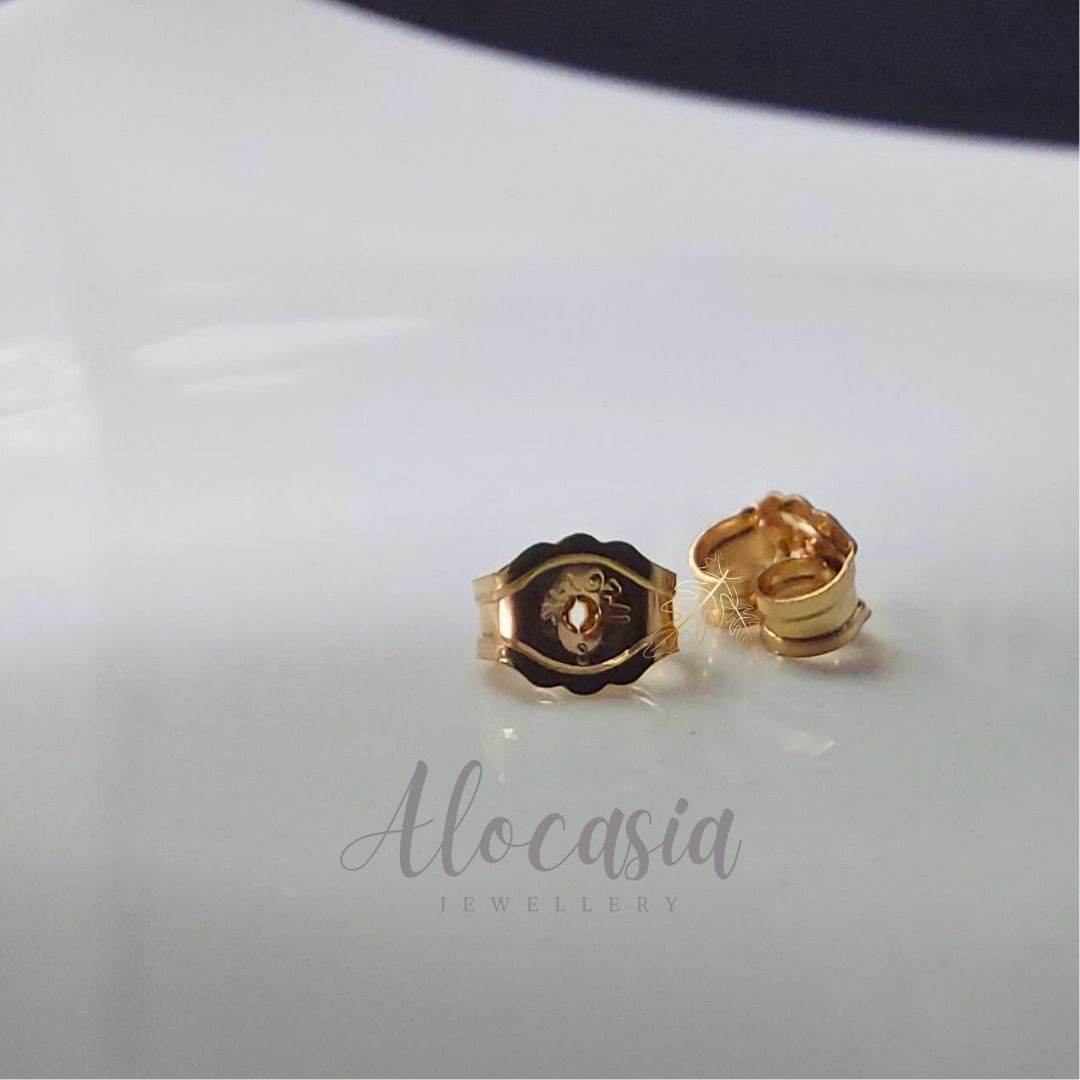 Gold earring store back piece