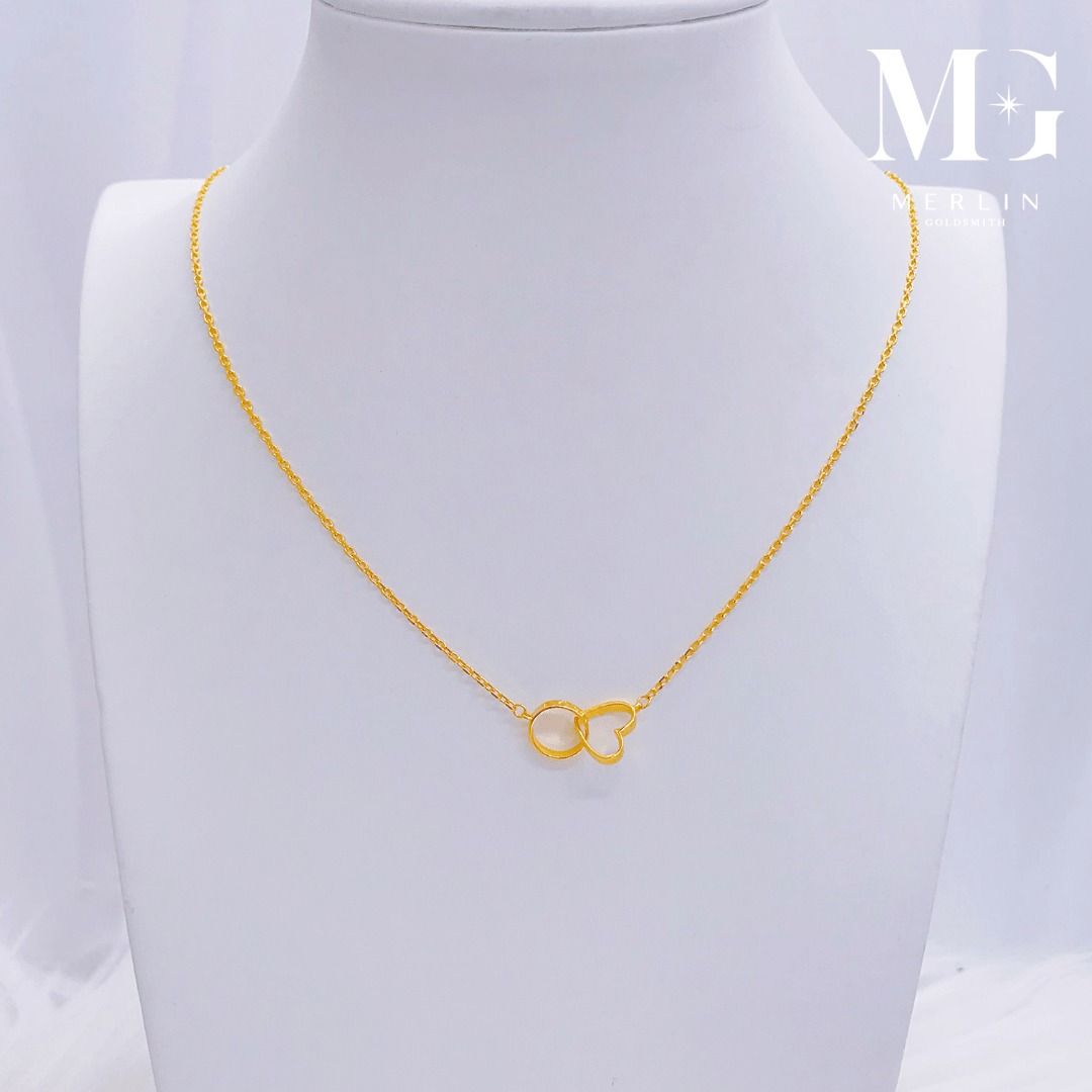 Gold interlocking outlet heart necklace