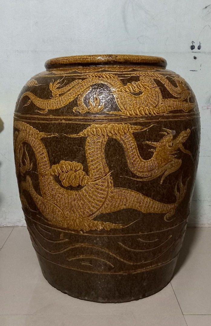 Antique martaban jar (Category: Vases & Decorative Bowls) located in Manila. Submitted by aikahzdm (Listing ID 1287258963, Image 2). Description: FS, ANTIQUE MARTABAN JAR WITH EMBOSSED DRAGON 30" H × 25" W kindly sent my Inbox If interested..
