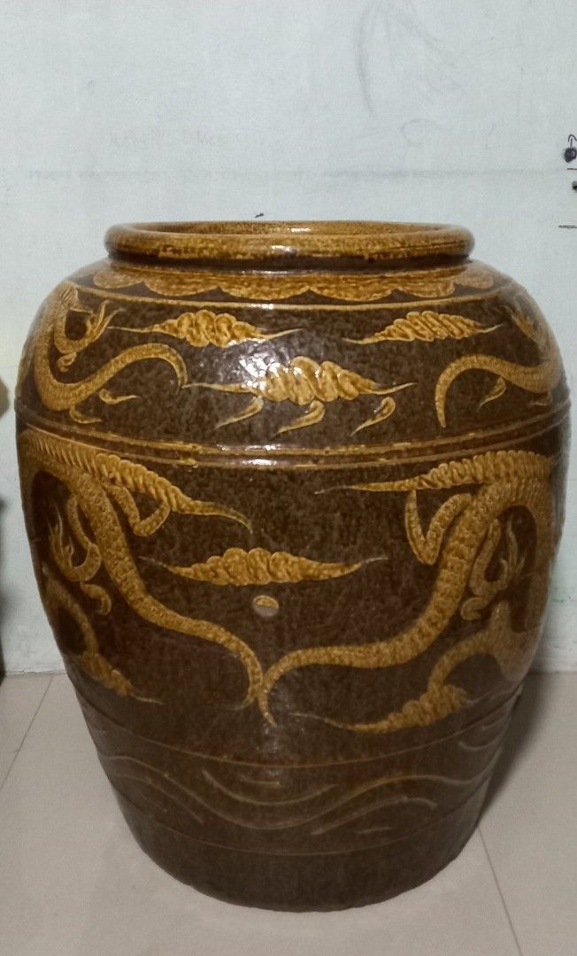 Antique martaban jar (Category: Vases & Decorative Bowls) located in Manila. Submitted by aikahzdm (Listing ID 1287258963, Image 3). Description: FS, ANTIQUE MARTABAN JAR WITH EMBOSSED DRAGON 30" H × 25" W kindly sent my Inbox If interested..