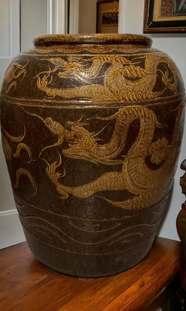 Antique martaban jar (Category: Vases & Decorative Bowls) located in Manila. Submitted by aikahzdm (Listing ID 1287258963, Image 1). Description: FS, ANTIQUE MARTABAN JAR WITH EMBOSSED DRAGON 30" H × 25" W kindly sent my Inbox If interested..