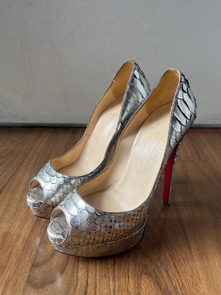 Christian louboutin hotsell snakeskin heels