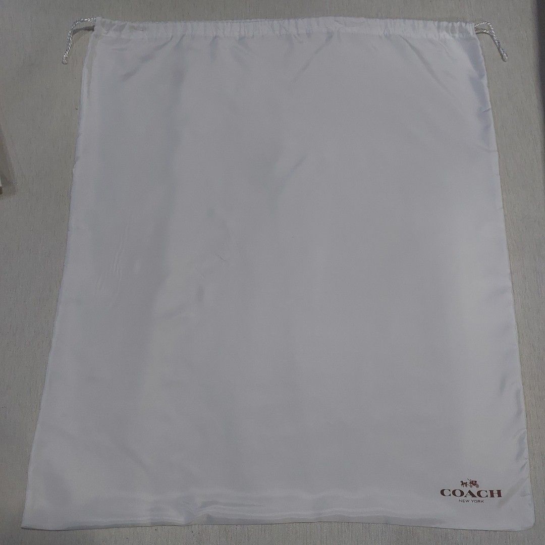 Authentic Coach dust bag 29x24 inches (Category: Luxury Bags & Wallets) located in Manila. Submitted by jfluxury.co (Listing ID 1287195228, Image 2). Description: excellent condition no flaws bought in Japan 🇯🇵 💯% Authentic. 😊 Money back guarantee. 😊 Clean and ready to use na po.