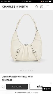 Charles and Keith Grommet Crescent Hobo Bag in Chalk
