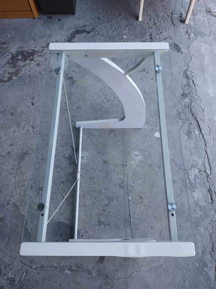 Computer table (Category: Tables & Sets) located in Quezon City. Submitted by matetdevis13 (Listing ID 1287259889, Image 2). Description: Modern glass top computer table Price : 4700 32L x 20W x 30H inches In good condition Code akc 570.