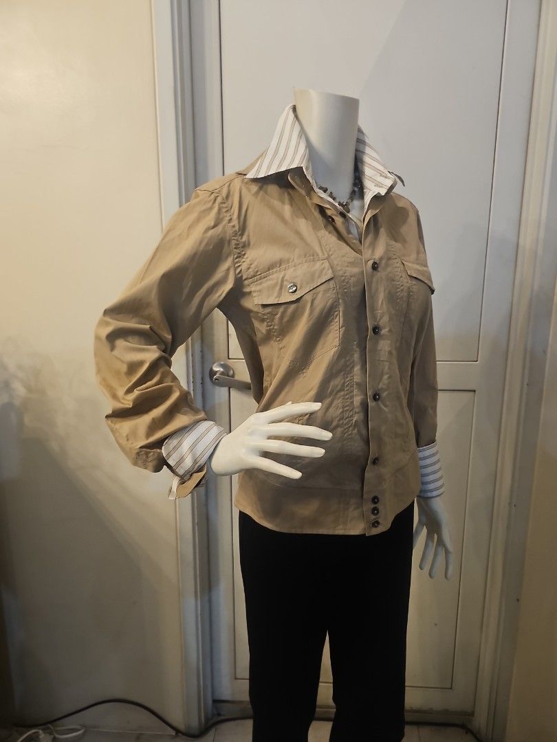 Dolce&gabbana two tone top (Category: Luxury Apparel) located in Quezon City. Submitted by mercyotero8 (Listing ID 1287249700, Image 3). Description: made in Italy with serial code all buttons marked dolce & gabbana preppy stripe on khaki combo measures shoulder 16 armpit 18 length 23.