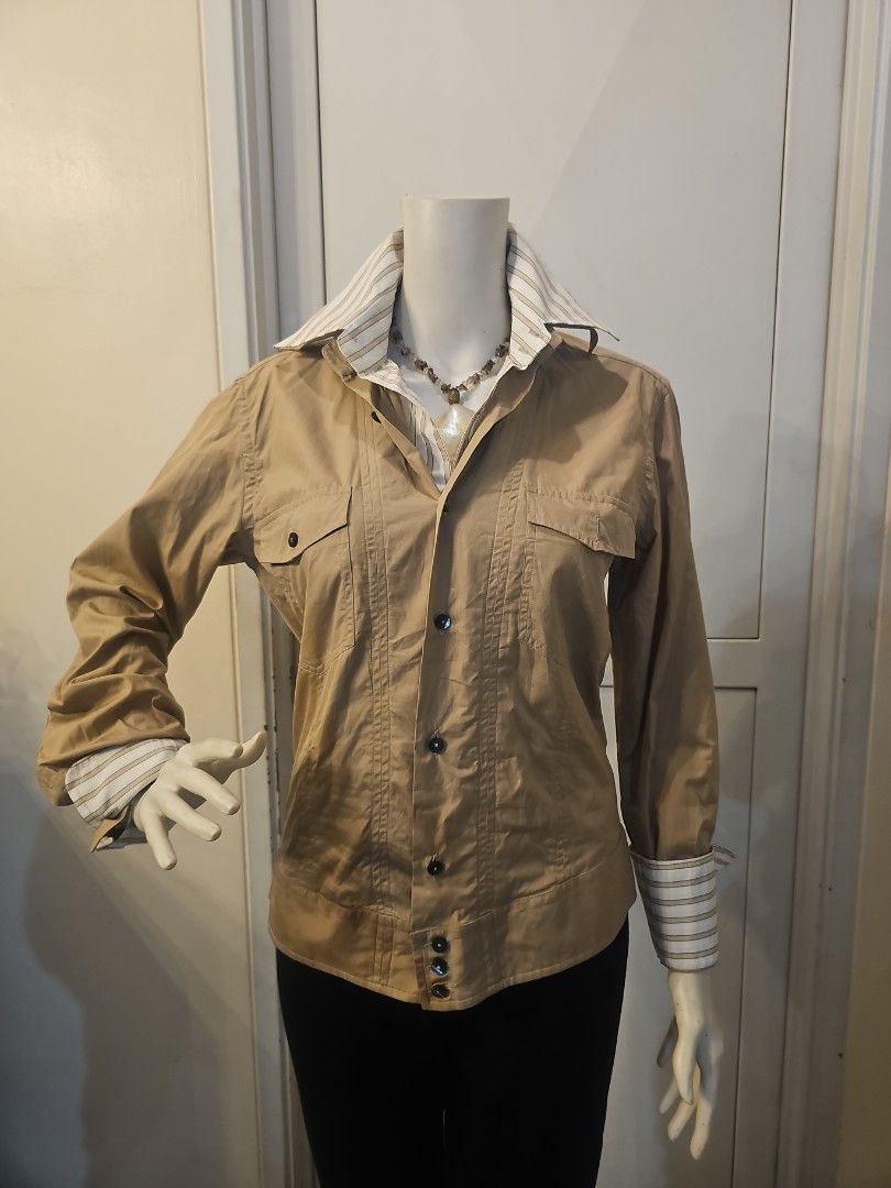Dolce&gabbana two tone top (Category: Luxury Apparel) located in Quezon City. Submitted by mercyotero8 (Listing ID 1287249700, Image 1). Description: made in Italy with serial code all buttons marked dolce & gabbana preppy stripe on khaki combo measures shoulder 16 armpit 18 length 23.