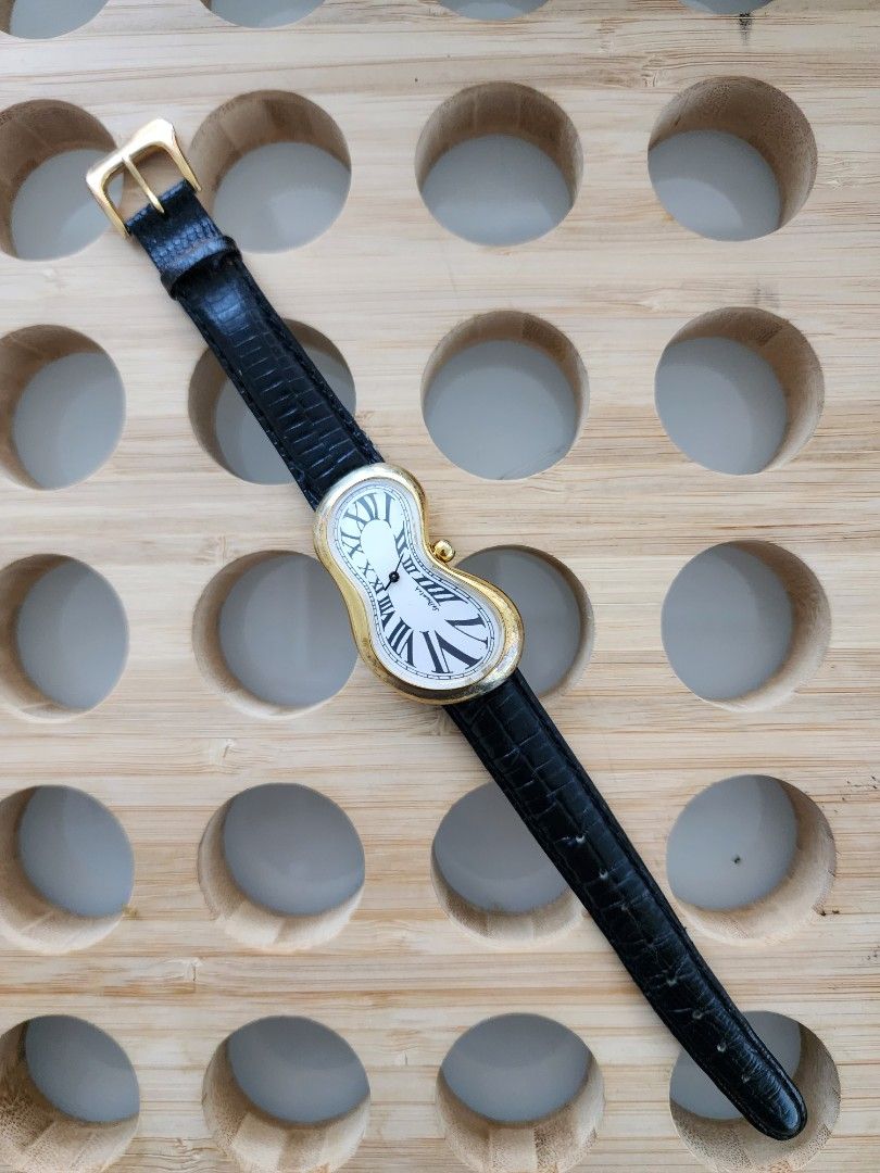 Exaequo watch 92006 dali cartier crash gold