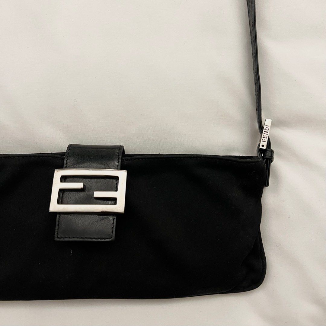 FENDI Baguette (Category: Luxury Bags & Wallets) located in Binan City. Submitted by lovedbynins (Listing ID 1287183287, Image 2). Description: Credit card straight payment accepted! (Within Laguna area only) Authentic Fendi Black Baguette, can be used as a fanny pack or shoulder bag. Used only a few times. Kindly message me for the bag’s code. No inclusion. Please view and zoom in all photos for details. .