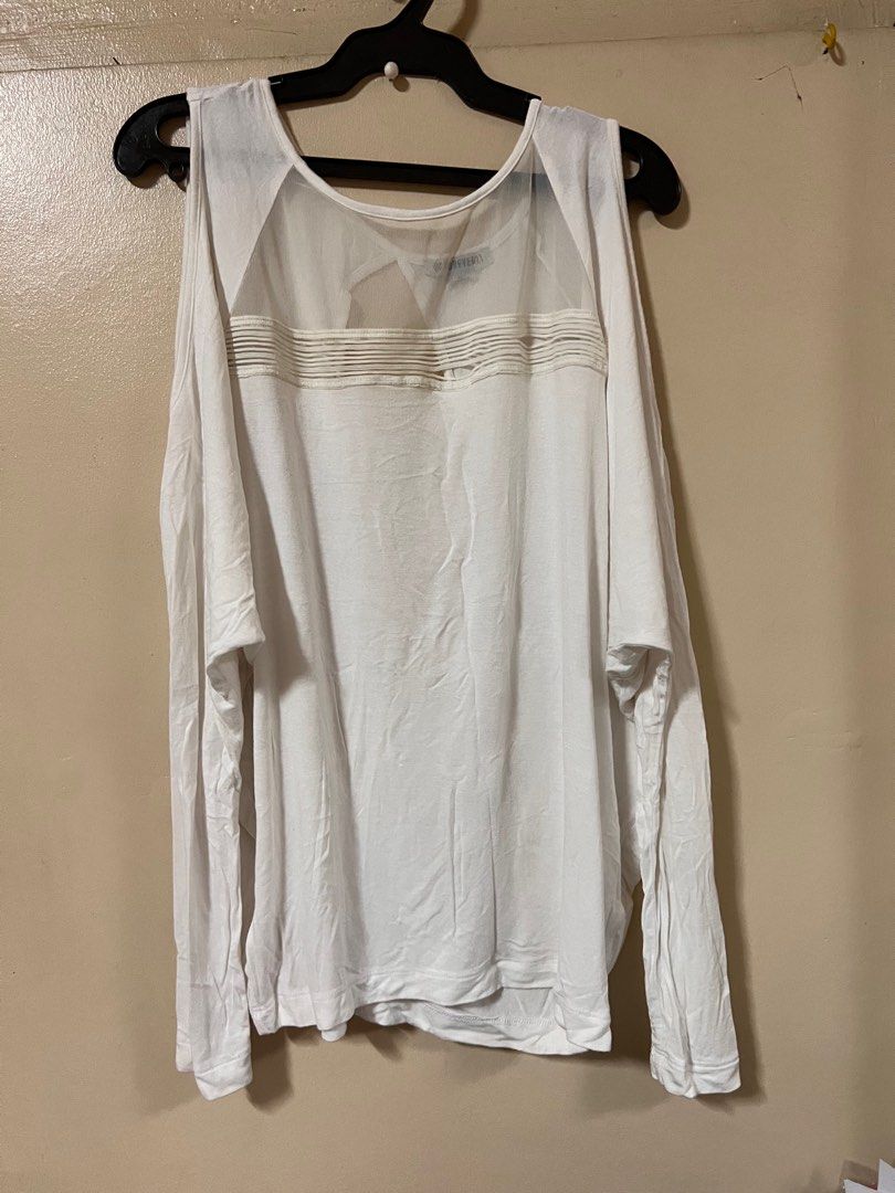 Forever 21 yoga long sleeve top (Category: Activewear) located in Lipa City. Submitted by out_of_the_closet_of_tinabamba (Listing ID 1287258090, Image 1). Description: Cotton Stretchy material With sheer/ see through design When laid flat; Armpit to armpit- 22 inches Length-22 inches.