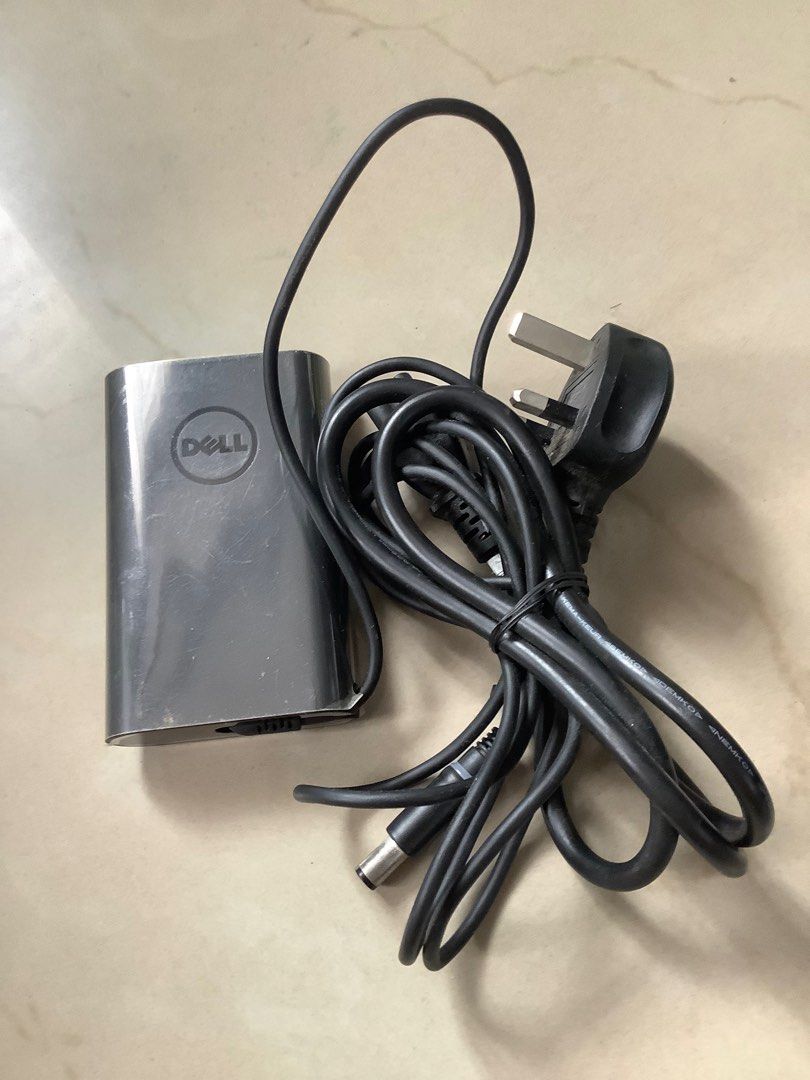 Original Dell Laptop Charger 65w (Category: Chargers) located in Manila. Submitted by purplemodel (Listing ID 1287287091, Image 1). Description: Extra unit Hindi nagamit Naalikabukan na lang sa taguan Pick up to check Selling as is San andres manila Thank you!.