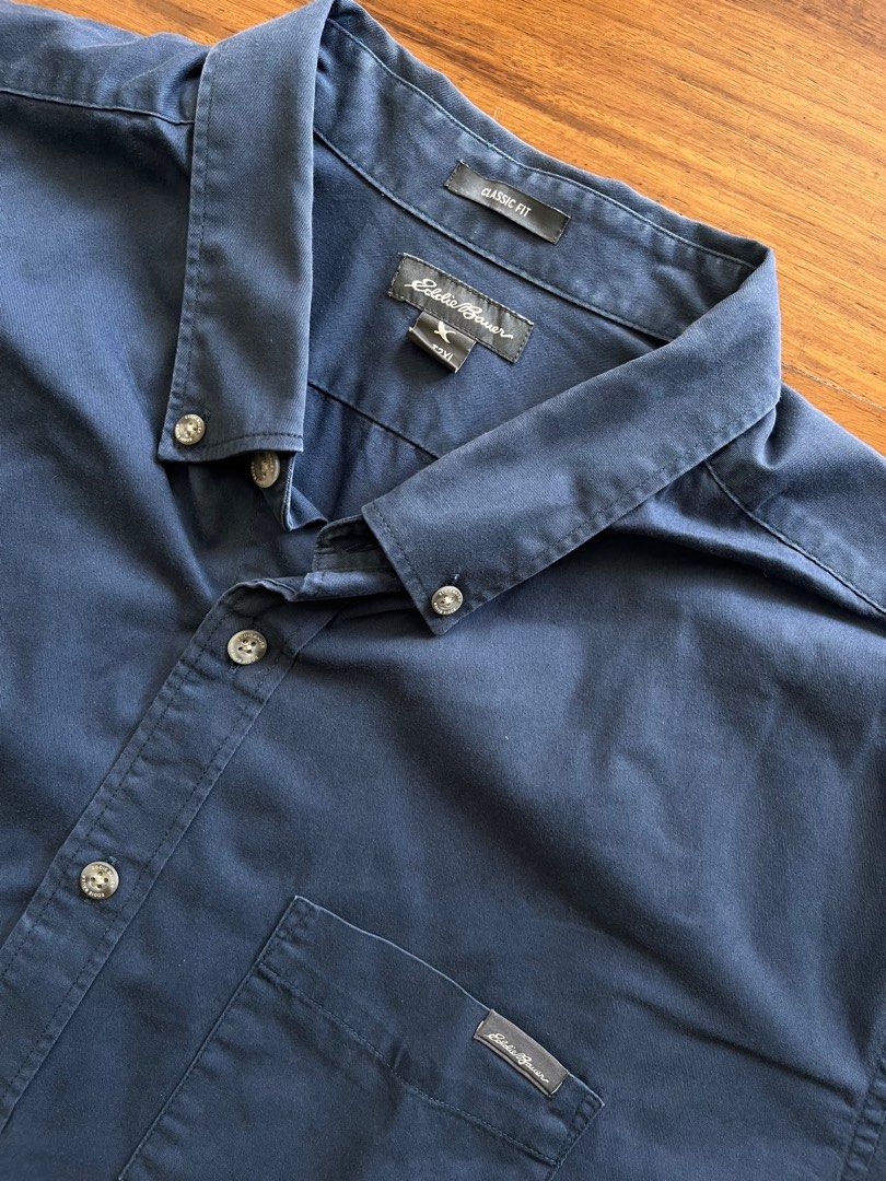 Plus Sized Eddie Bauer Classic Buttondown Shirt (Category: Tshirts & Polo Shirts ) located in Muntinlupa City. Submitted by _sbstnm (Listing ID 1287211268, Image 2). Description: Eddie Bauer classic outdoor buttondown shirt in dark blue gray. Plus sized for taller gents. Tag size: XXL Actual measurements (inches, laid flat) Width: 27 Length: 36 MOP: Gcash or BPI transfer only Shipping: Lalamove, GrabExpress, J&T Express parcel (fees to be shoulde