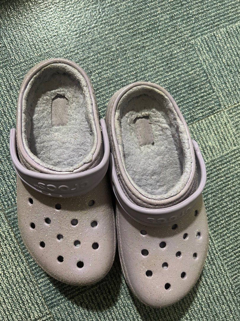Preloved authentic crocs glitter lined clogs size J1 (Category: Babies & Kids Fashion) located in San Jose del Monte. Submitted by devski (Listing ID 1287257795, Image 2). Description: US bought Glitter lined clogs Color lavender Size J1 (or US1) Already washed pero pwede mo ulit labhan if medyo maselan :) No heel drags, rarely used by my kid Rfs : outgrown.