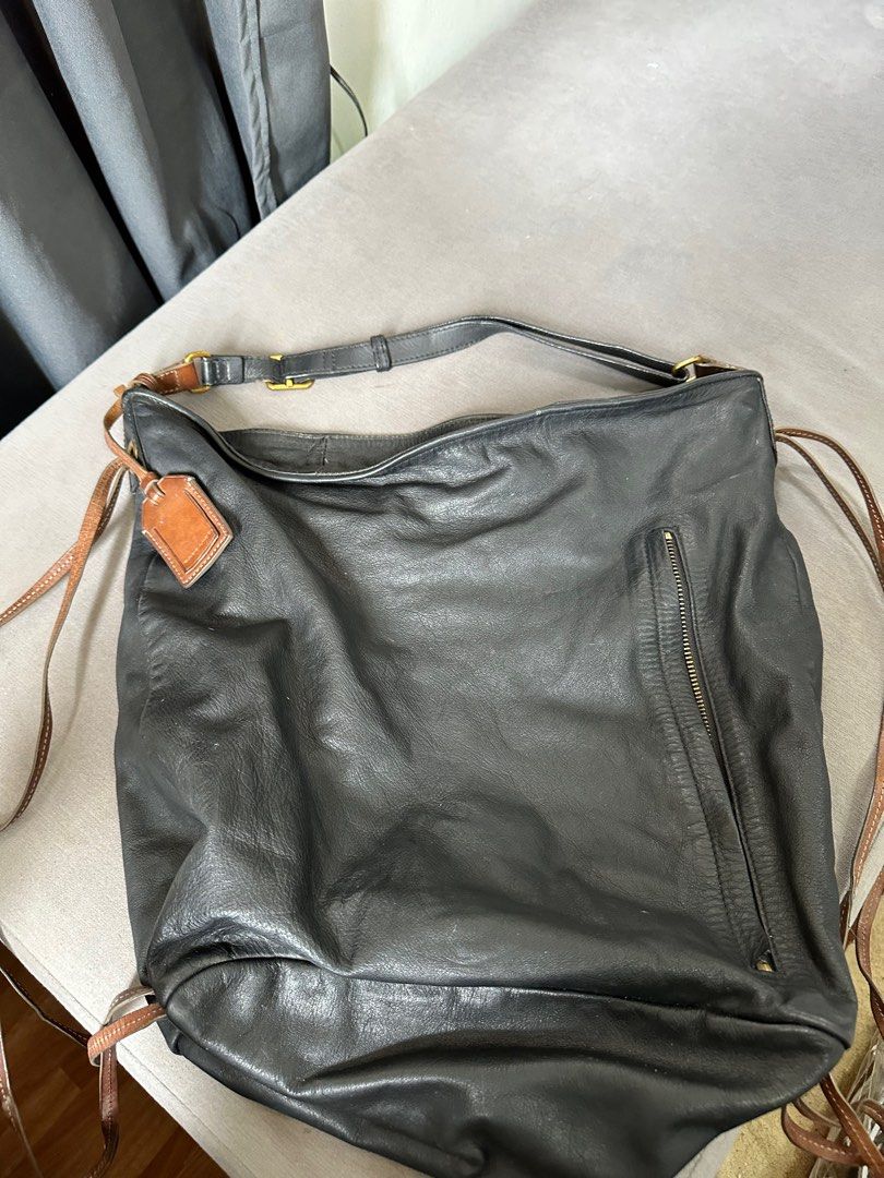 Rabeanco 3in 1 Hobo/Shouder/backpack bag (Category: Luxury Bags & Wallets) located in Manila. Submitted by mochii13 (Listing ID 1287175811, Image 1). Description: Well loved, one of my favorites bought at 250usd. Some flaws include missing zip handle (it got detached and don’t know where I put it) and signs of usage.