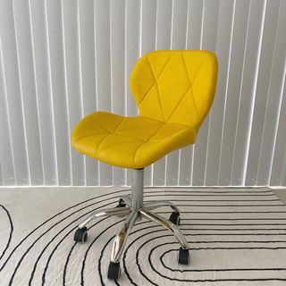 Yellow faux leather office swivel chair with wheels