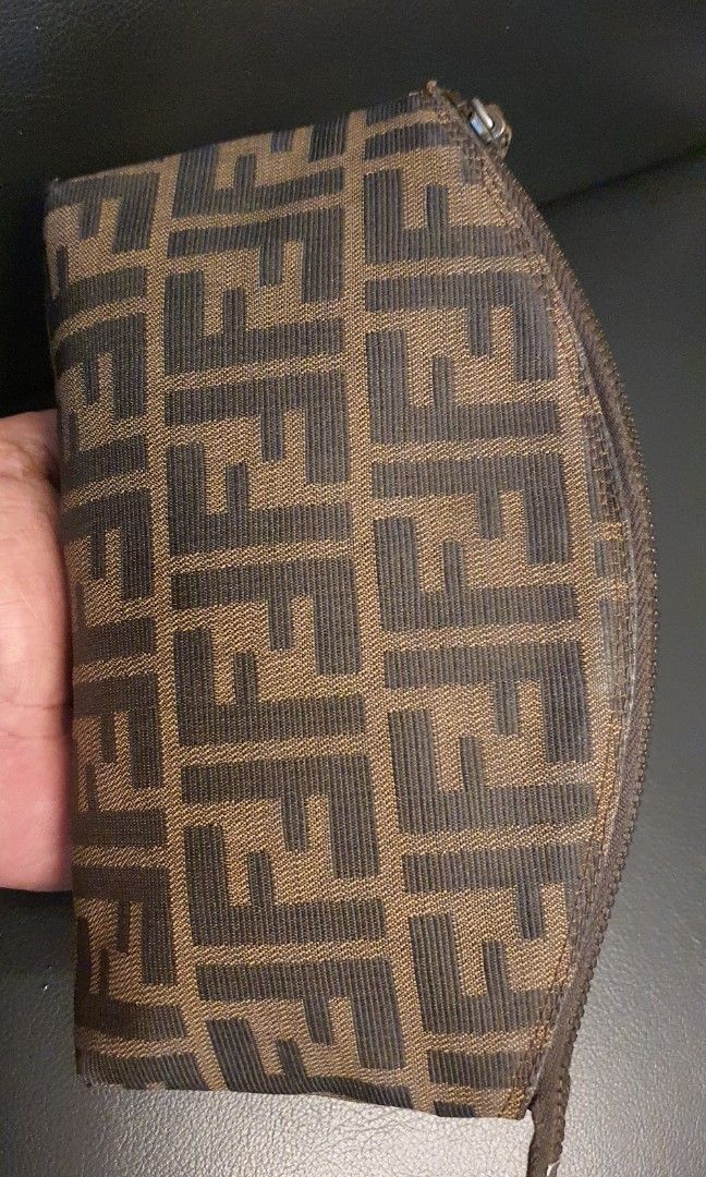 Authentic fendi pouch (Category: Luxury Bags & Wallets) located in Cavite. Submitted by ohmie23 (Listing ID 1287329734, Image 1). Description: Authentic fendi pouch issue corner sign of use.